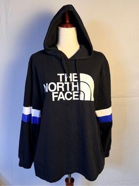 The North Face Black Hoodie Sweatshirt with White Logo and Blue Accents, active